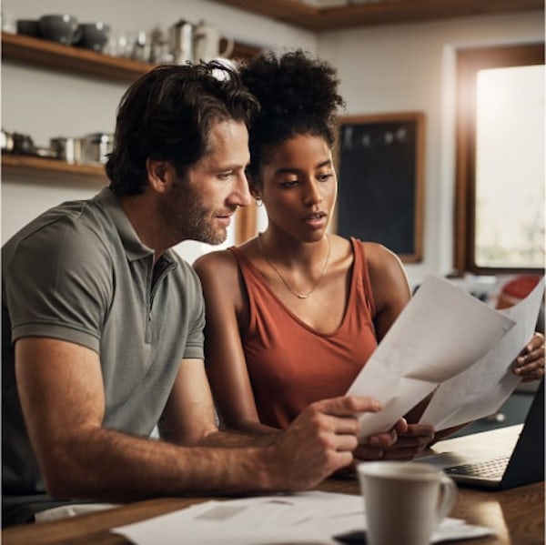 Man and woman looking at papers